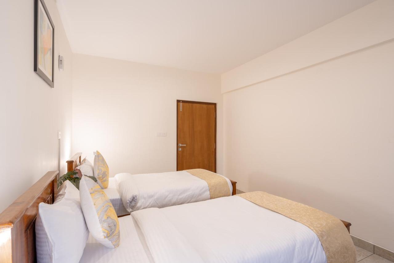 The Silver Chimes Suites Bangalore Exterior photo